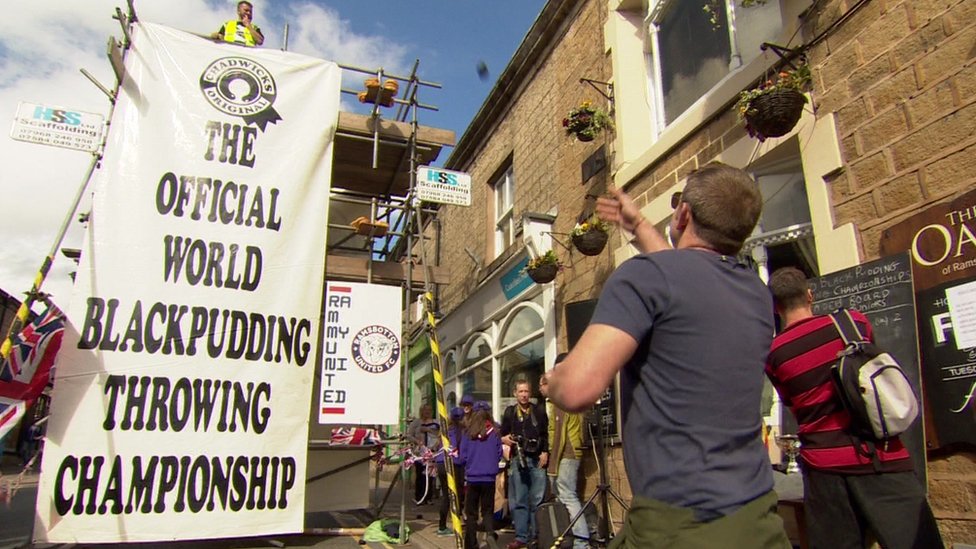 World Black Pudding Throwing Championships. Dropping Sausages from a Tower in Lancashire, England